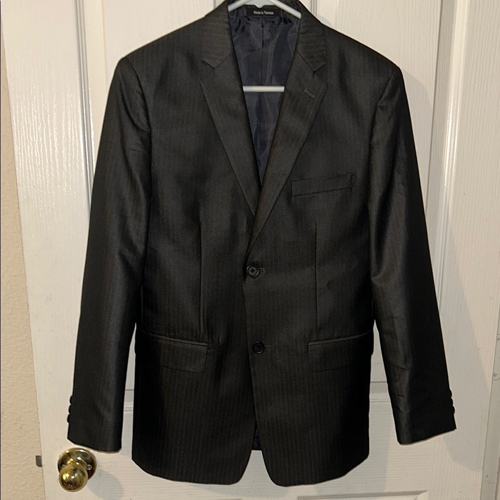 Child’s suit. New.  Gray with pinstripes.  Size 16